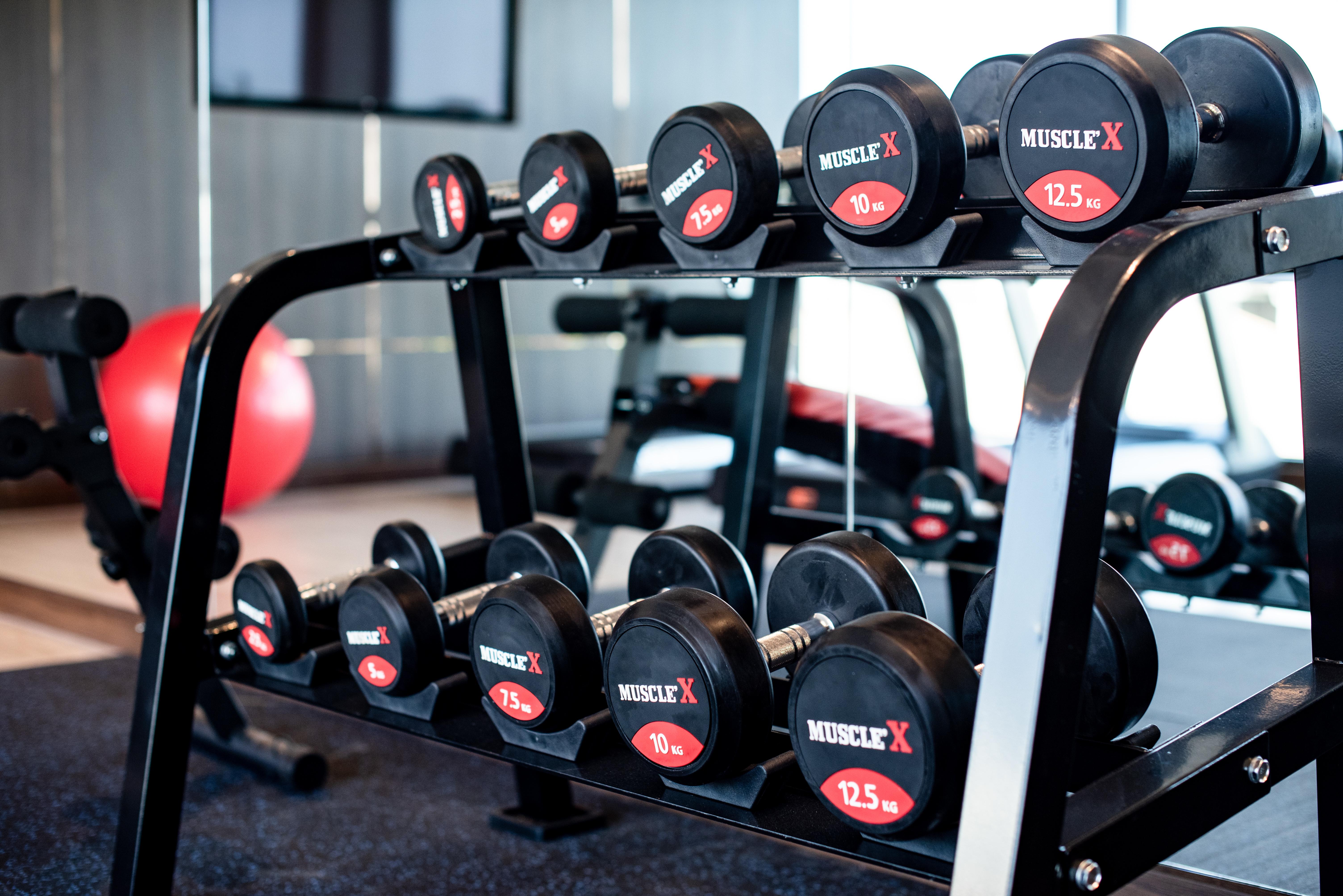 Blackwoods Hotel Pattaya - Sha Extra Plus Exterior photo Dumbbells on a rack